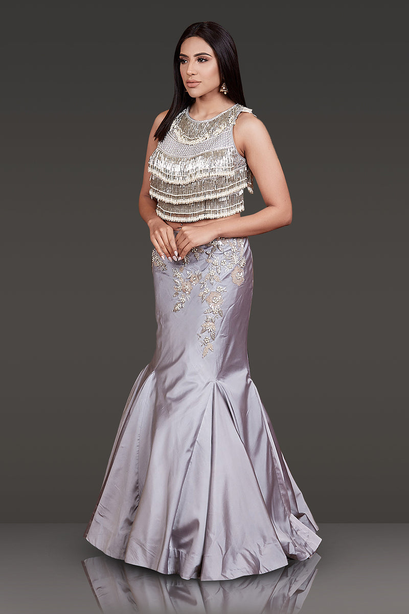 GREY TOP FULL EMBROIDERED AND TASSELS ON IT WITH FISH CUT SKIRT WITH EMBROIDERY NET SCARF
