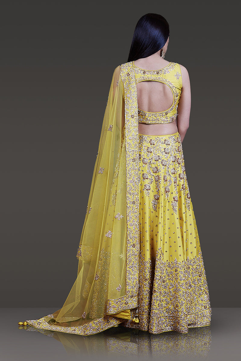 Bright Yellow Taffeta Silk Lehenga-Top-Dupatta Embossed with Ivory Gold & Stone Work