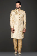 Ivory Gold Brocade Sherwani With Gold Dabka Embroidery Paired With Gold Chudidar