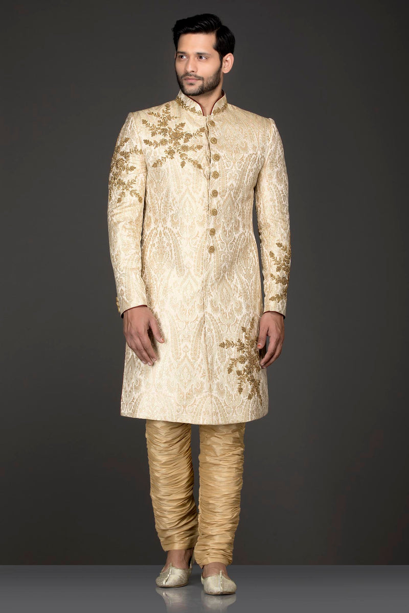 Ivory Gold Brocade Sherwani With Gold Dabka Embroidery Paired With Gold Chudidar