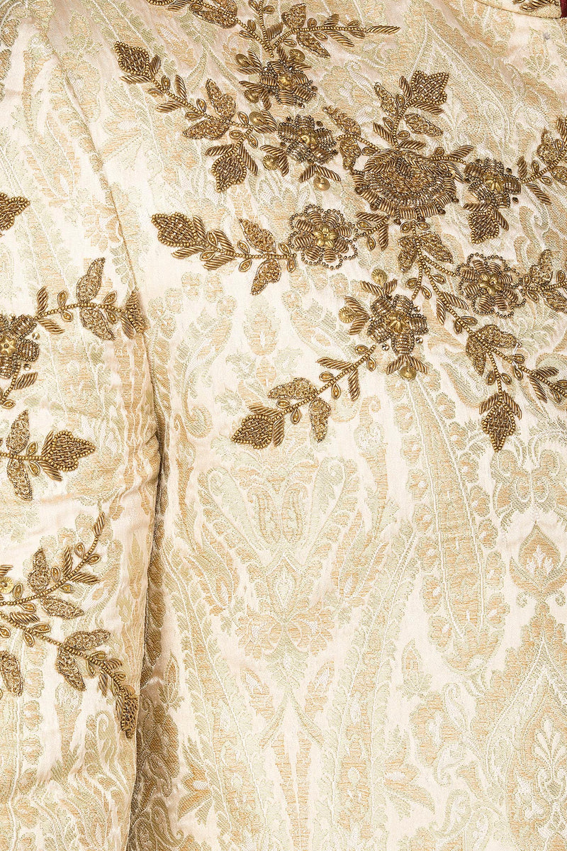 Ivory Gold Brocade Sherwani With Gold Dabka Embroidery Paired With Gold Chudidar