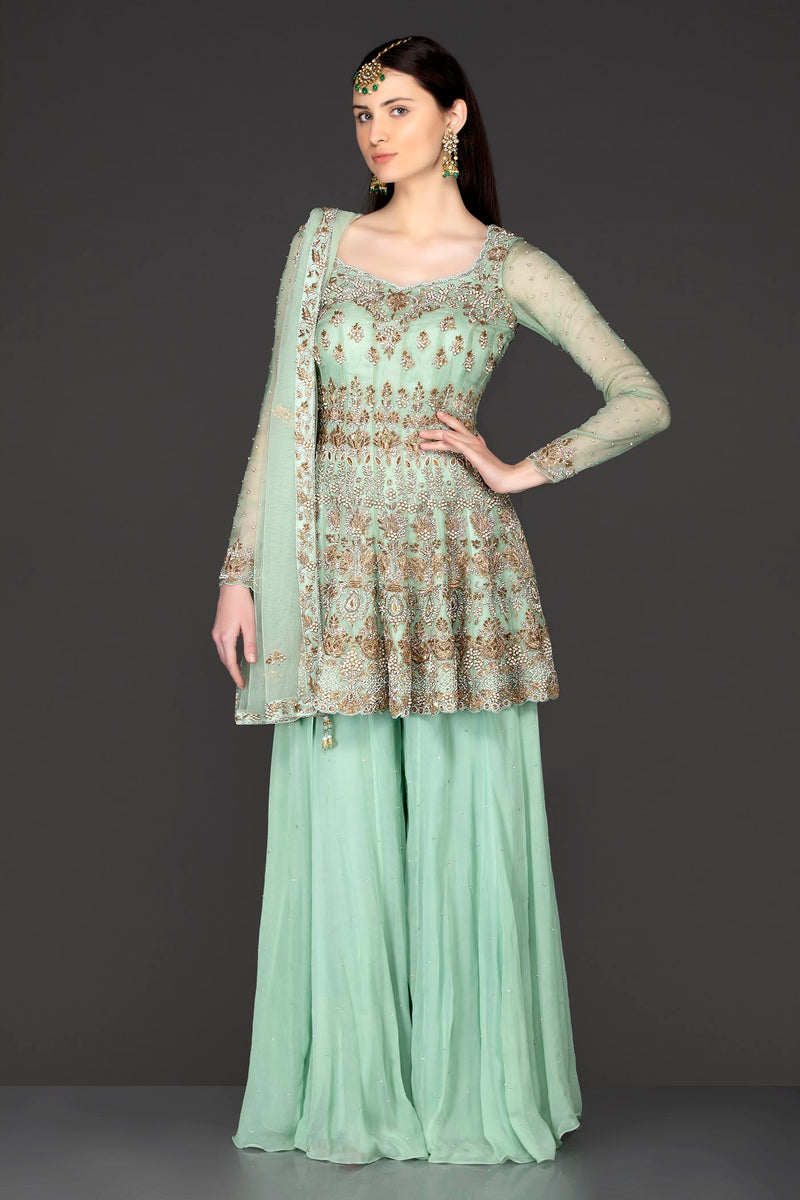 Mint Green Asymmetrical Peplum Top With Georgette Sharara And Net Dupatta
