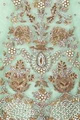 Mint Green Asymmetrical Peplum Top With Georgette Sharara And Net Dupatta
