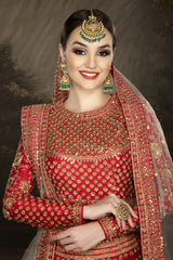 Traditional Red Bridal with a Belt and Contrasting Peach Dupatta